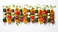 Grilled veggie skewers on a gray rectangle plate. Vegan meal idea.