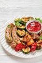 grilled white sausages with veggies and mushrooms Royalty Free Stock Photo