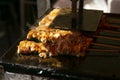 Grilled yakitori chicken skewers at an Izakaya restaurant