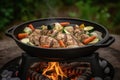 a griller with chicken and veggies, ready to cook