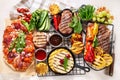 Grilletables and meat. Cooked steak, corn, pepper, peach on light background. Food concept