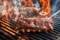 Grilling baby back pork ribs over flaming grill Royalty Free Stock Photo