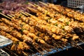 Grilling barbecue meat skewer kebab at traditional night market in South Korea Royalty Free Stock Photo