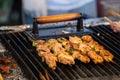 Grilling barbecue meat skewer kebab at traditional night market in South Korea Royalty Free Stock Photo