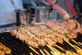 Grilling barbecue meat skewer kebab at traditional night market in South Korea Royalty Free Stock Photo