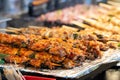 Grilling barbecue meat skewer kebab at traditional night market in South Korea Royalty Free Stock Photo