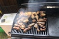 Grilling delicious variety of meat on barbecue grill