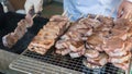 Grilling japanese pork tongue skewer