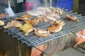 Grilling marinated meat on stove Royalty Free Stock Photo