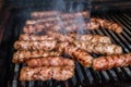 Grilling Meat on barbecue grill with hot coal Royalty Free Stock Photo