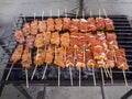 Grilling pork on the charcoal stove for sale in the fresh market Royalty Free Stock Photo