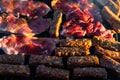 Grilling  pork chops on barbecue grill. BBQ in the garden Royalty Free Stock Photo