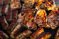 Grilling  pork chops on barbecue grill. BBQ in the garden Royalty Free Stock Photo