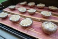 Grilling portobello mushrooms on cedar plank Royalty Free Stock Photo