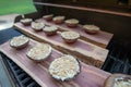 Grilling portobello mushrooms on cedar plank Royalty Free Stock Photo