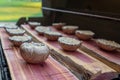 Grilling portobello mushrooms on cedar plank Royalty Free Stock Photo