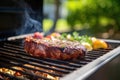 grilling steak on a sunny day in a backyard