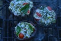 Grilling stuffed Portobello mushrooms on outdoor grill Royalty Free Stock Photo