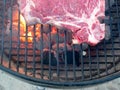 Grilling T-bone steak Royalty Free Stock Photo