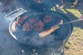 Grilling time! Grill, garden, green grass and good weather Royalty Free Stock Photo