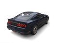 Grim blue urban muscle car - rear top view Royalty Free Stock Photo