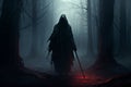 The Grim Reaper in a Hooded Cloak in a Dark Forest Royalty Free Stock Photo