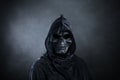 Grim reaper over dark misty background Royalty Free Stock Photo