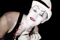 Grimace mime in white hat Royalty Free Stock Photo