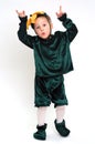 Grimacing boy in costume Royalty Free Stock Photo