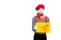 grimacing mime showing gift box