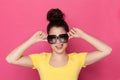 Grimacing Woman In Big Sunglasses In Sticking Out Tongue Royalty Free Stock Photo
