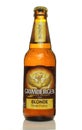 Grimbergen Blonde cold beer bottle isolated on white background