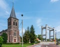 Grimbergen, Flemish Brabant, Belgium - Catholic church of the village against blue sky