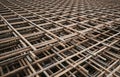 Grime and Steel: Though weathered, the structural integrity of this wiremesh is set to define the next phase of construction Royalty Free Stock Photo
