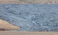 A unique natural attraction. People are walking over the new lavafield of the volcano eruption Royalty Free Stock Photo