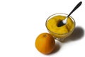 Grinded orange in bowl isolated on a white background.Fruit.Copy space Royalty Free Stock Photo