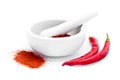Grinded red paprika spice in the mortar isolated on white background Royalty Free Stock Photo