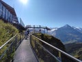 Grindelwald First, Switzerland. An adventure in the mountains.The dizzying footbridge at the edge of the abyss.