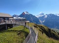 Grindelwald First, Switzerland. An adventure in the mountains.The dizzying footbridge at the edge of the abyss.