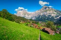 Grindelwald mountain resort with high snowy mountains in background, Switzerland