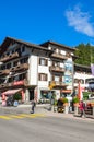 Grindelwald, Switzerland - August 16, 2019: Street in picturesque Alpine village Grindelwald. A popular starting point for hiking