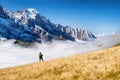 Tourist with a backpack in the mountains. Mountain hiking in the high mountains. Travel and adventure. Active life. Landscape in t