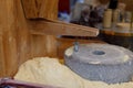 grinding grain into fresh flour at the local market Royalty Free Stock Photo