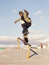 Grinding like a pro. a skateboarder performing a trick on a rail.