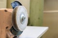 grinding machine with abrasive wheel close-up, selective focus Royalty Free Stock Photo