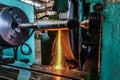 Grinding on the machine, high-precision machining of parts with an abrasive wheel on a circular grinding machine with cooling Royalty Free Stock Photo