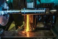 Grinding on the machine, high-precision machining of parts with an abrasive wheel on a circular grinding machine with cooling Royalty Free Stock Photo