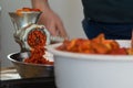 Grinding paprika for Ajvar, Serbia