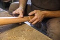 Grinding and polishing the guitar wooden neck. hand-made musical instruments