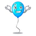 Grinning blue balloon character on the rope